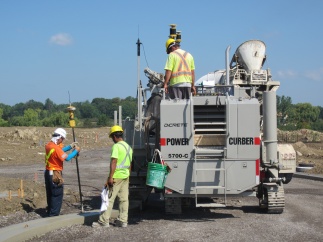 Curb machine control helps on huge residential subdivision
